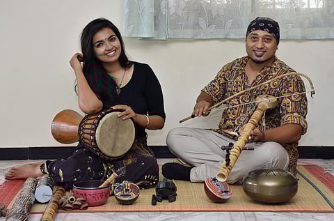 Charumathi Muralidharan and Leon James with their indigenous musical instruments (Pic: U Rakesh Kumar)