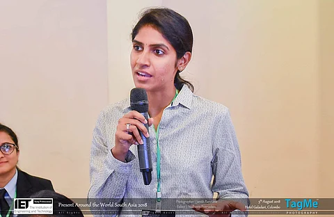 Likitha Chandrashekara speaking at an event