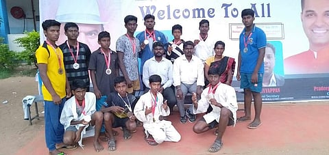 The students with their PE coach Angeline