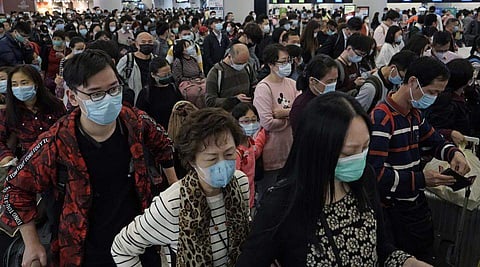 Passengers wear protective face masks (Pic: Google)