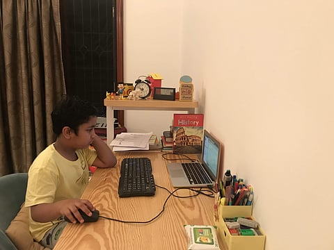 Samarth Chitta working on the script to record