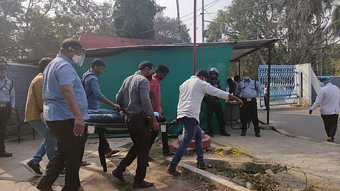 The student being carried to the health centre