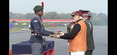 Gaffney Jerel receiving the prestigious baton