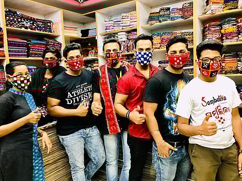 Flaunting the mask | (Pic: Sambalika - The New Innovation)