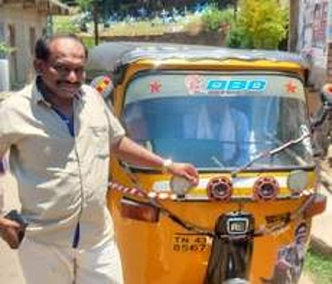P Jayaprakash with his autorickshaw at Gudalur in the Nilgiris distric