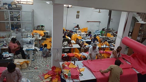 Tailors stitching hundreds of PPE kits at Gadag (Pics: Dr Pavan Patil)