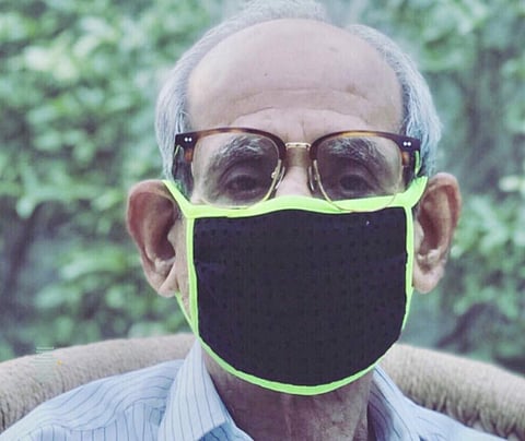 Avishi's grandfather wearing one of the ADK masks