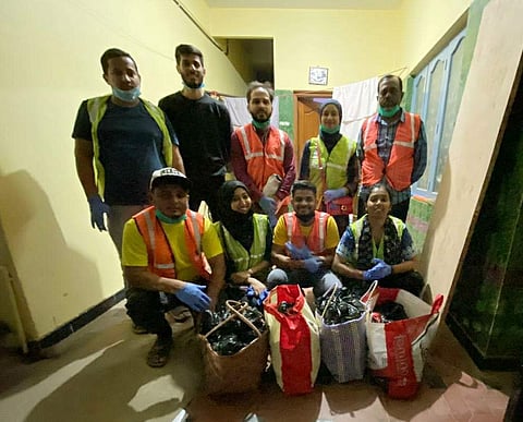 Noor Zahira along with her team with food packets