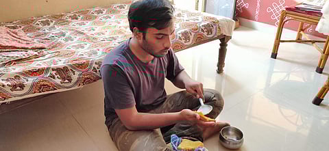 Kiran making sandwiches