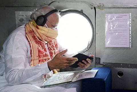 Prime Minister Narendra Modi conducts aerial survey of areas affected by Cyclone Amphan (Pic: ANI)