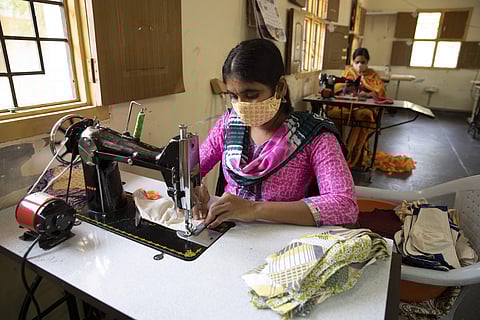 The tailors at work. Credit:RDT