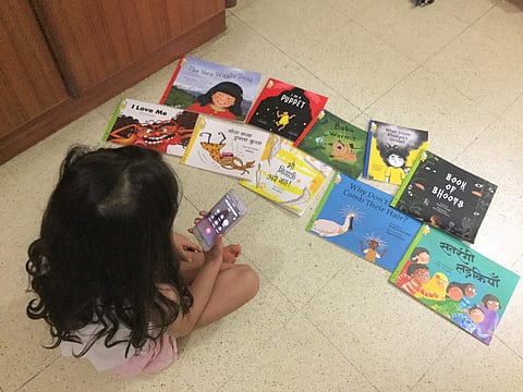 A child listening to a story | (Pic: Pratham Books)