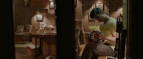 Sushant Singh Rajput reading an edition of GQ in Dil Bechara