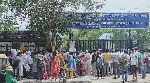 The long queues are a common sight in front of SDM offices (Pic: Sourced)