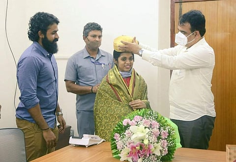 Dr Ashwathnarayan C N, Deputy Chief Minister, felicitated Meghana after she cleared UPSC (Pic: Twitter)