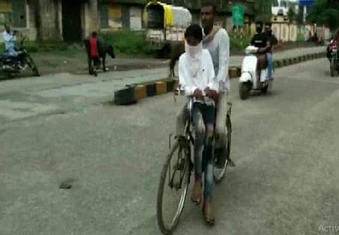 The father cycling