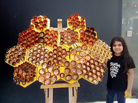 Ahana Rhea Berkin with her Beeconscious installation | Pic: Kumudam Berkin
