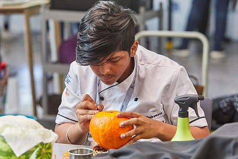Yeshwanth Kumar Umasankar at the live carving event | Pic: Yeshwanth's father