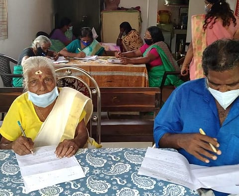 Kuttiyamma writing the Kerala State Literacy Mission test | Pic: Sourced