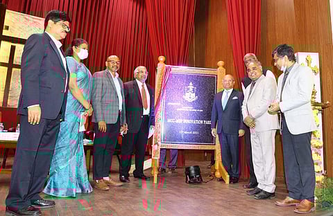 KM Mammen, Principal Wilson and other dignitaries unveil the plaque