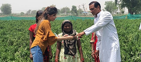 Nikita Bhatia on ground with farmers (Pic: Sourced)