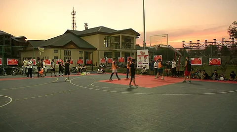 Youth enjoy a basketball session in Srinagar. (Pic: ANI)