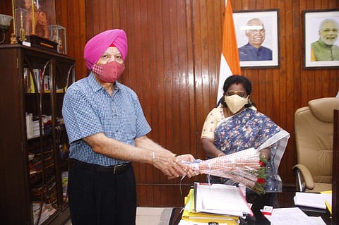 Dr Singh presents the letter to the Governor (Pic: Pondicherry University)