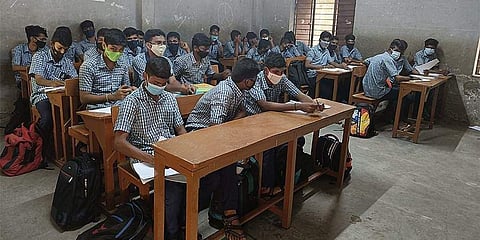 Students seated at the Government Higher Secondary school in Chennai's Velachery without physical distancing | Pic: Express