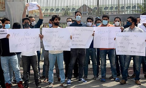 A protest held by PhD scholars in Kashmir's Srinagar before the curfew hit |Pic: DailyExcelsior
