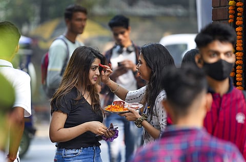 A first-year student being welcomed by a senior on the first day of the academic session, at Delhi University's Ramjas College | Pic: PTI