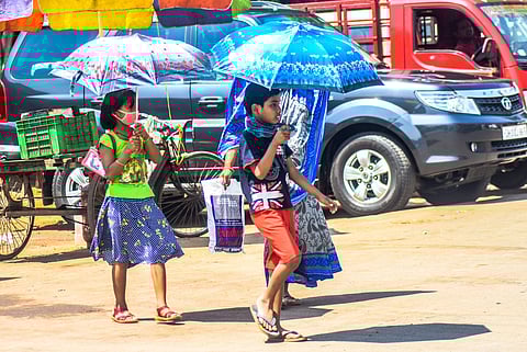 Students walking in the heat image for representational photo only | (Pic: Express)