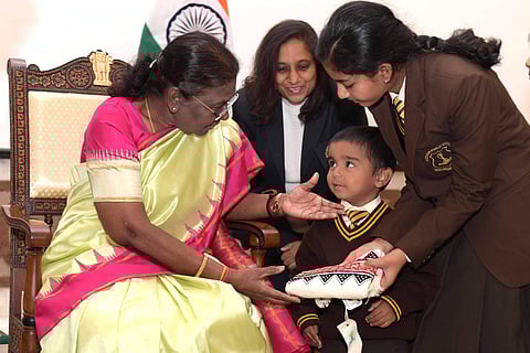 Children from various schools and organisations met President Droupadi Murmu at Rashtrapati Bhavan on the occasion of Children's Day. (Pic: @rashtrapatibhvn)
