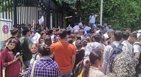 Students gathered in front of University Stadium on June 3 | Credit: Source