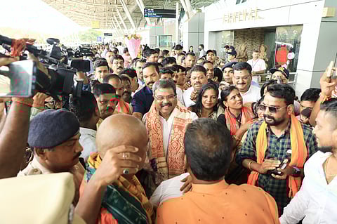 Dharmendra Pradhan being received at the Bhubaneswar airport today