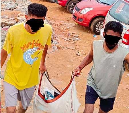 Students from Bengaluru cleaning the temple beach of Gokarna as a punishment for creating nuisance