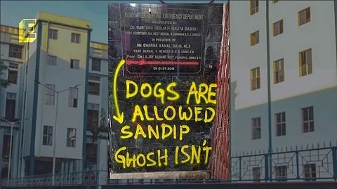 "Dogs are allowed, Sandip Ghosh isn't" reads plaque outside CNMC, Kolkata 