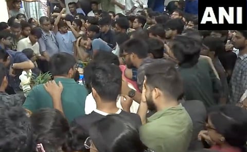 Students gheraoing the principal 