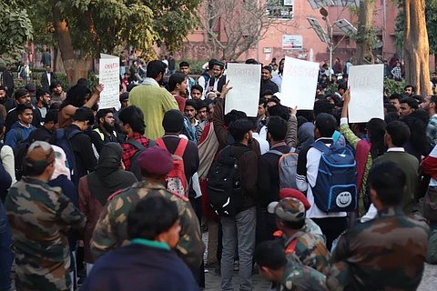 Students accuse administration of repression as security presence intensifies.