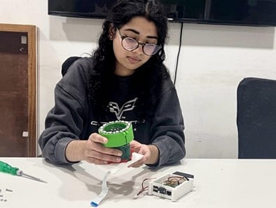 Delhi student Anushka Manoj showcases her portable AI eye screening device helping detect diabetic retinopathy