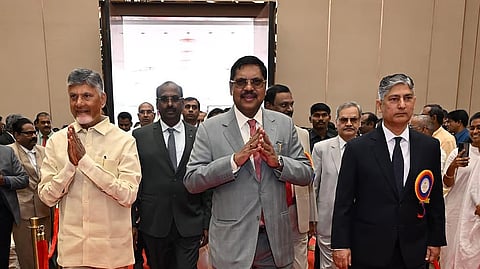 Chief Justice of India BR Gavai (middle) and Andhra Pradesh CM N Chandrababu Naidu (L).