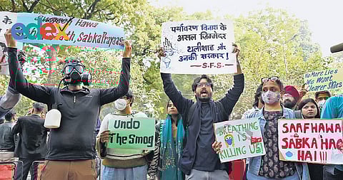 Residents stage a protest at Jantar Mantar on Tuesday criticising government for not tackling pollution crisis 