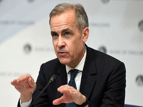 Canadian PM Mark Carney pushes back on claims he softened Davos remarks after call with Trump