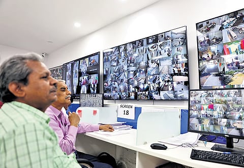 Officials monitor CCTV feeds from Intermediate exam centres at the state command control room in Hyderabad on Monday.