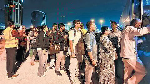 Photo provided by one of the returnees shows people from Bahrain boarding buses to cross the border to Saudi’s Dammam airport. The first set of passengers from war-hit Bahrain reached Kerala in a chartered flight on Sunday
