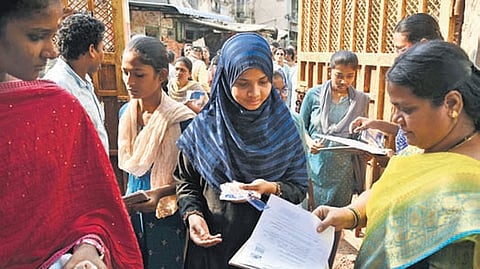 SSC students enter an examination centre in Vijayawada.