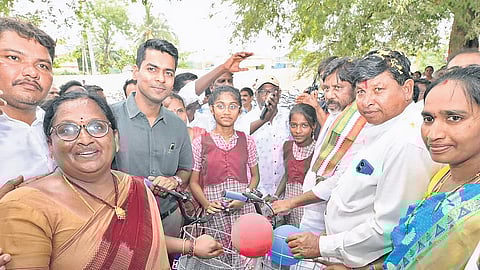 Deputy Chief Minister Mallu Bhatti Vikramarka distributes bicycles to students under the Amma Foundation initiative at Bonakal in Khammam district on Thursday.