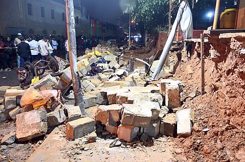 A wall collapsed many died due to heavy rain at Shivajinagar in Bengaluru on Wednesday.