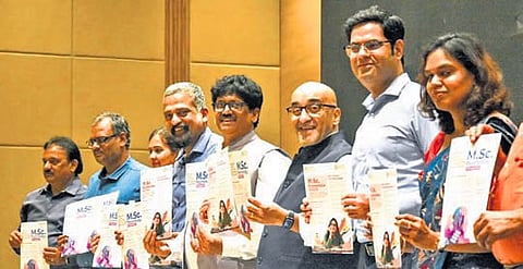 SRM University VC Ch Satish Kumar along with the university staff release the flying of newly introduced AI-Integrated M.Sc Economics and M.Sc Psychology courses during the press conference in Vijayawada on Wednesday. 