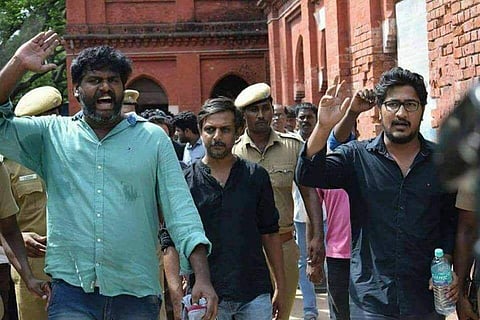 Thirumurgan Gandhi (centre) says protesting gives him the confidence to oppose the power that fails to function
