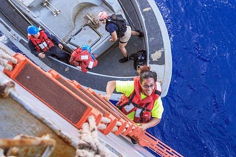The two women sailors were overcome with emotion when they sighted the rescue teams| Jonathan Clay/US Navy